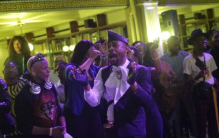 Audience members at the ball