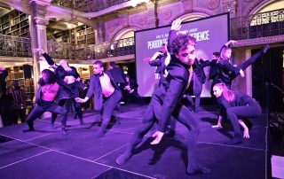 A group of dancers on a stage