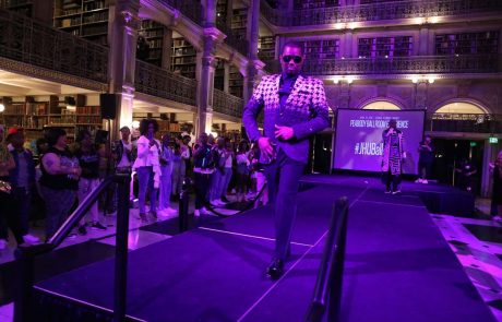 A performer on the stage at the George Peabody Library