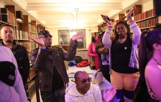 People clapping in a Library