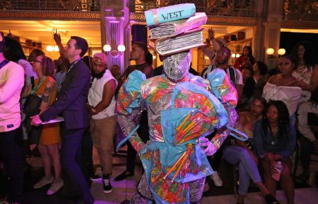 A performer in a suit
