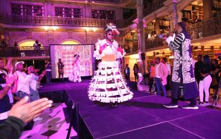 A performer on the stage at the George Peabody Library