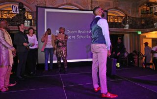 A performer on the stage at the George Peabody Library