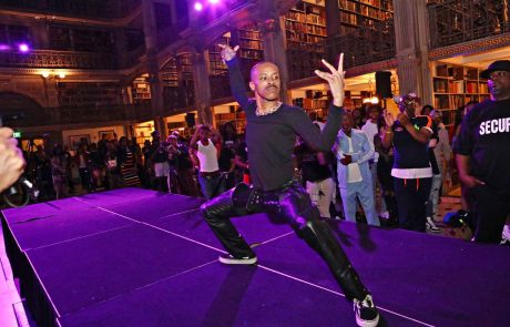 A performer on the stage at the George Peabody Library